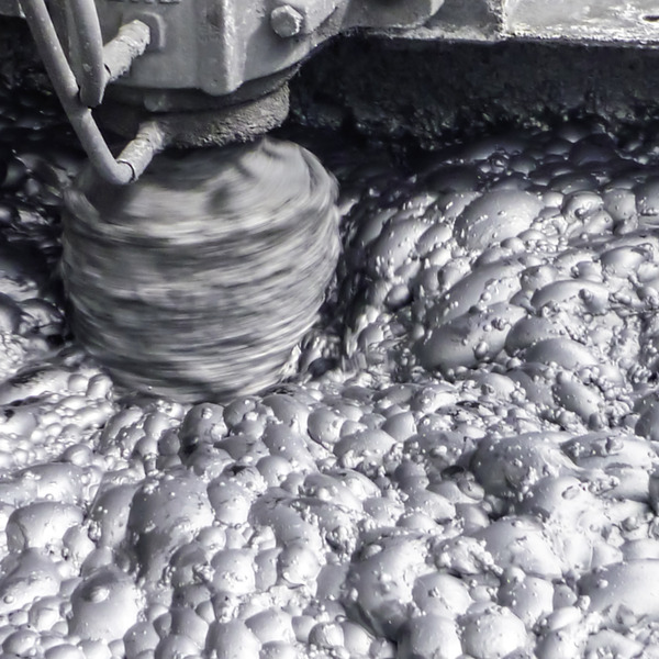 gray foam in a flotation tank is stirred up by an agitator gray foam in a flotation tank is stirred up by an agitator